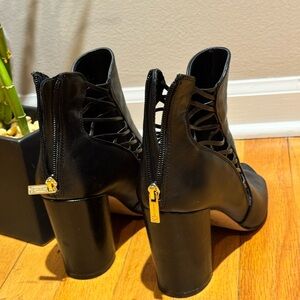 Jessica Simpson Black Lace-Up Heeled Boots